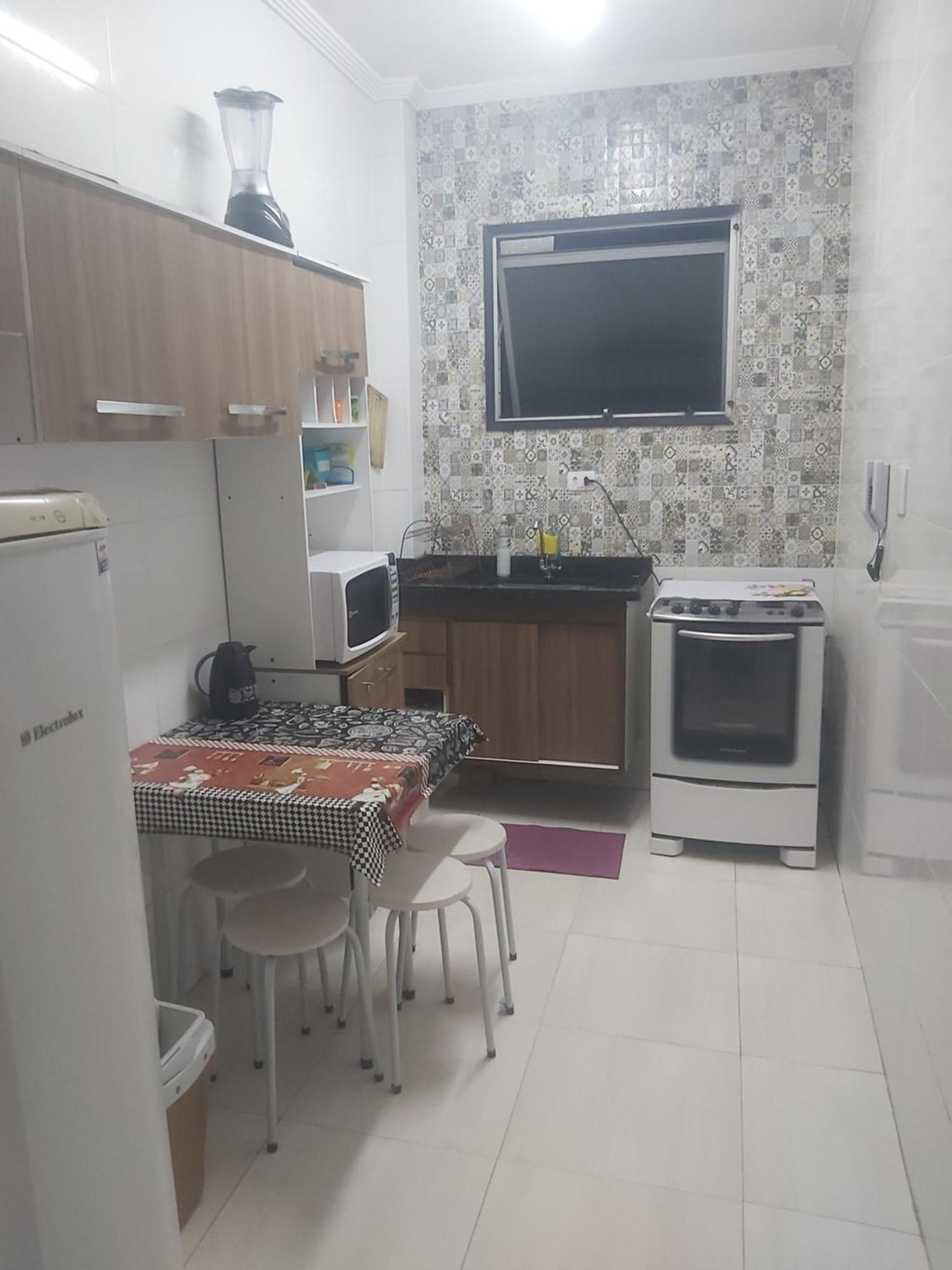 Apto pé na areia São Vicente Quarto foto
